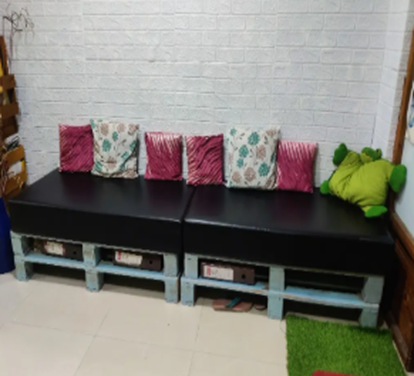 Waiting area with colorful cushions